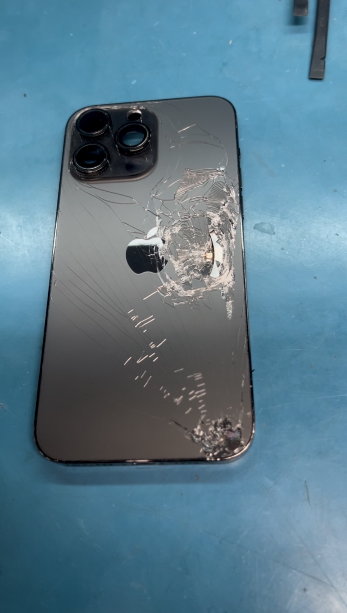 Cracked iPhone back glass before repair — CellRepair Chula Vista
